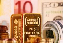 Vàng thế giới quay đầu giảm khi đồng USD ổn định